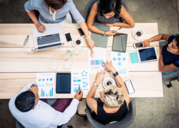 a group in company training around a table
