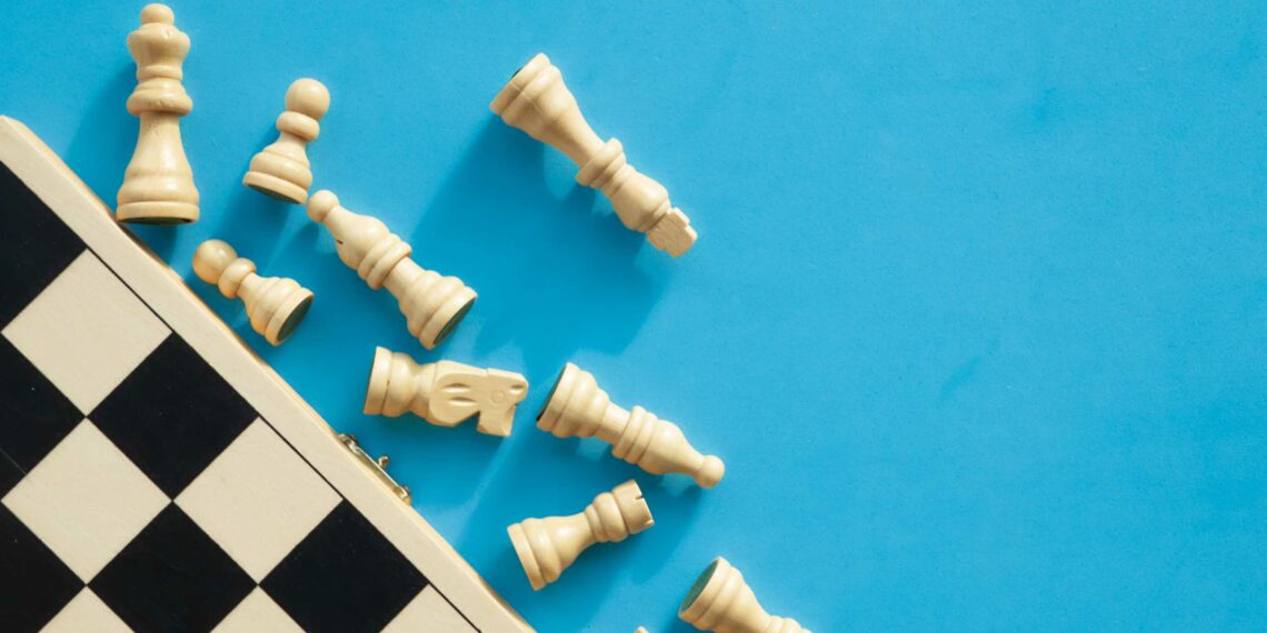a chessboard on a light blue background