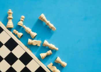 a chessboard on a light blue background