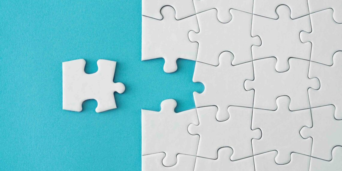 A puzzle piece detaches from the rest