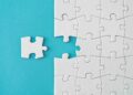 A puzzle piece detaches from the rest