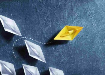 An Agile Yellow paper boat can quickly change direction and overtakes competitors