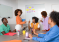 Woman giving a training to a group of people